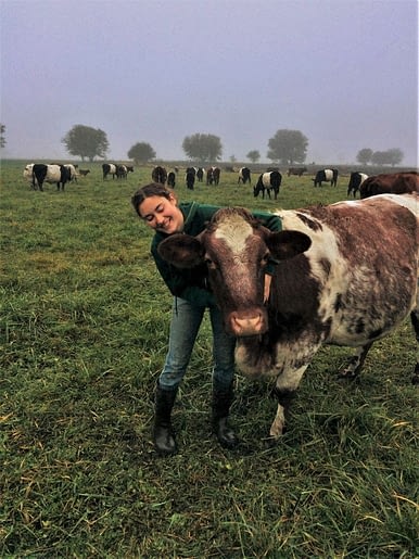 Martha with her heritage cows on pasture